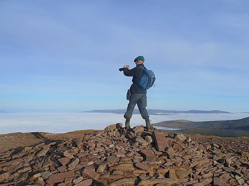 Geographer on rocks