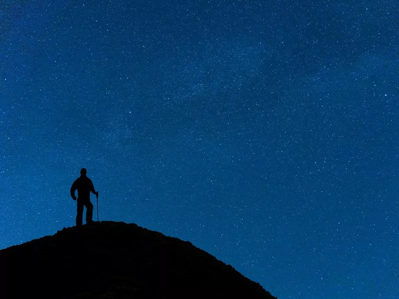 Man climber on the peak