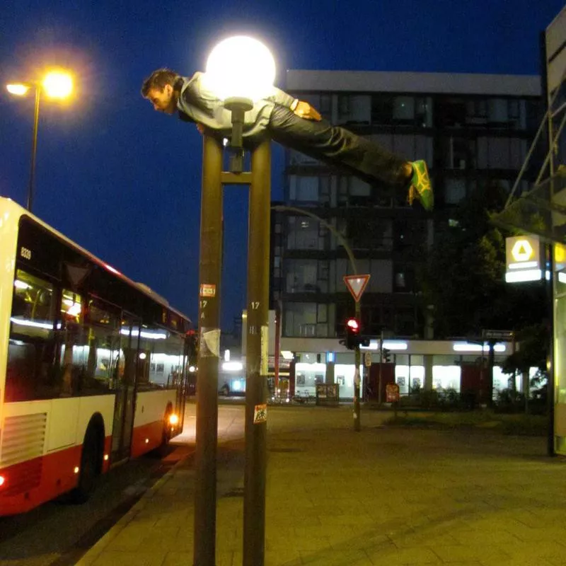 Planking on street light