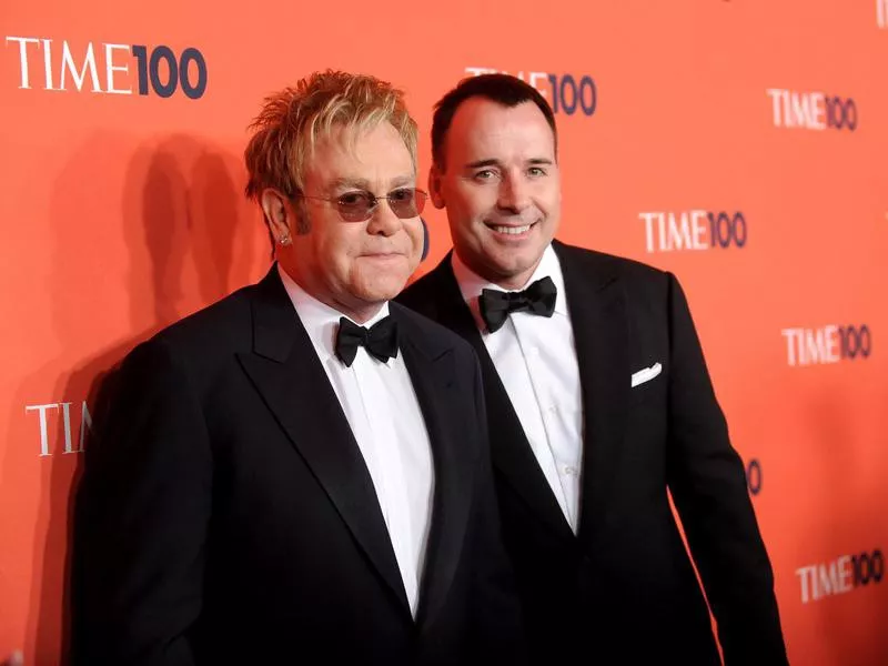 Sir Elton John and husband David Furnish attend the Time 100 gala