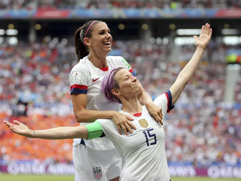 Megan Rapinoe celebrating