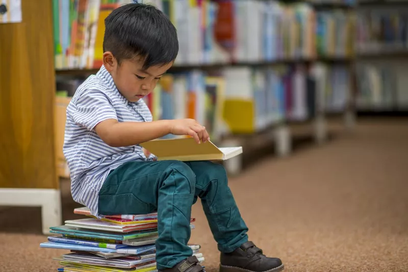 Little boy reviewing kindergarten sight words