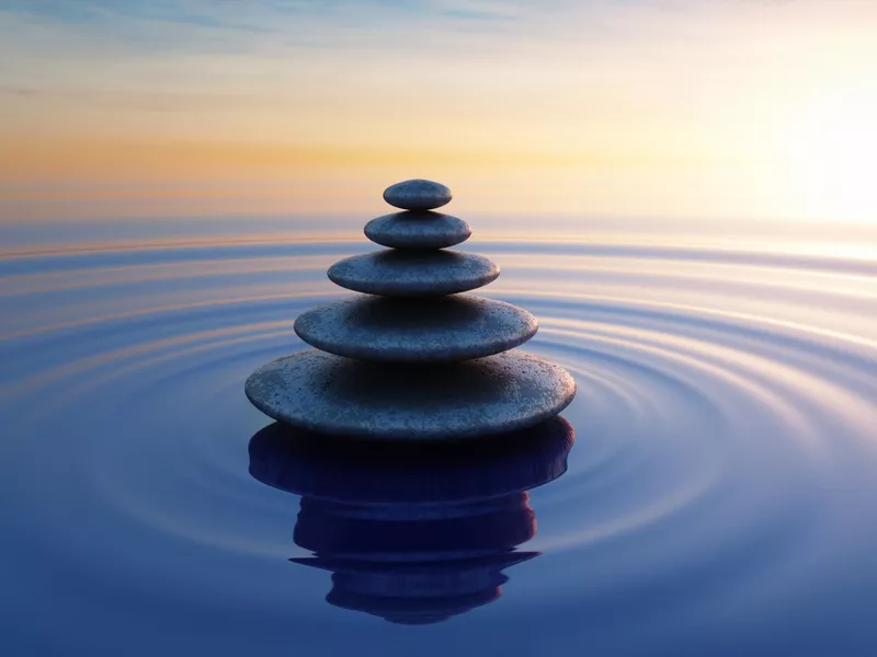 Stack of stones in calm ocean