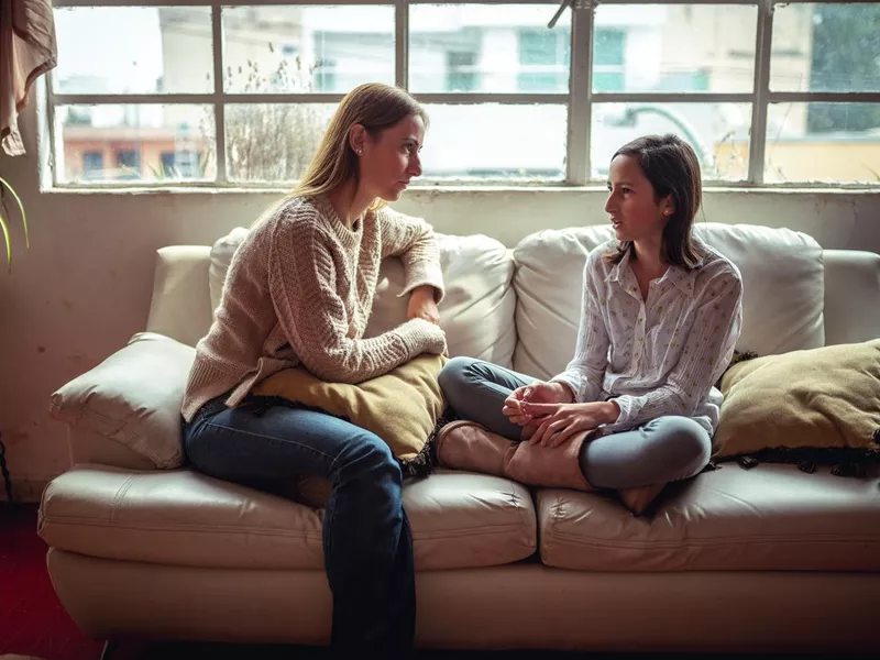 Mother and daughter talking