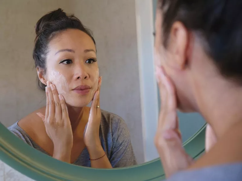 Woman taking care of her skin