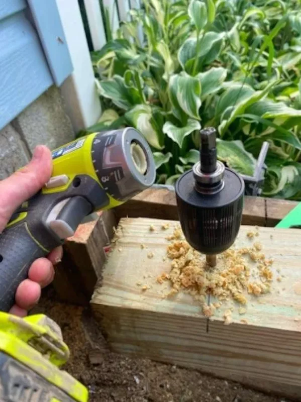 Drill nail stuck in wood