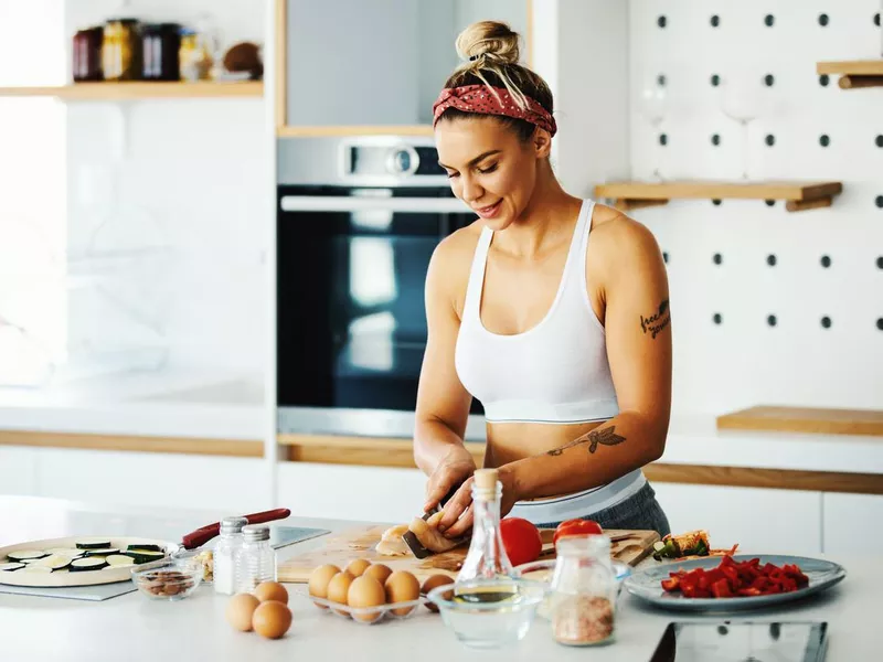 Woman cooking in kitchen