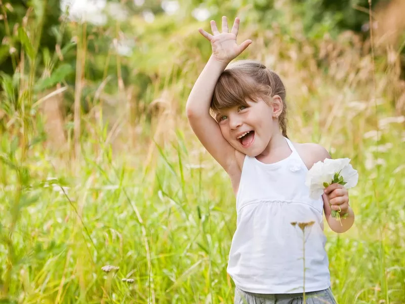 Little Girl Waving High