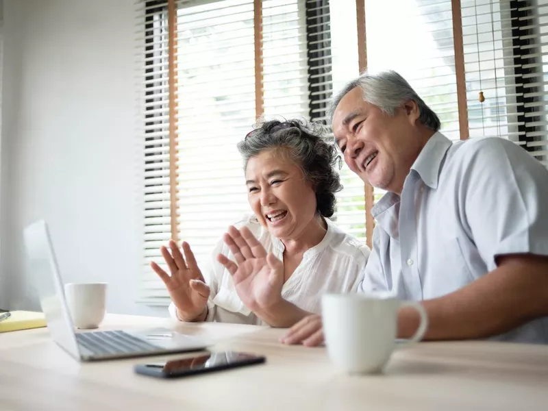 Senior couple making video call