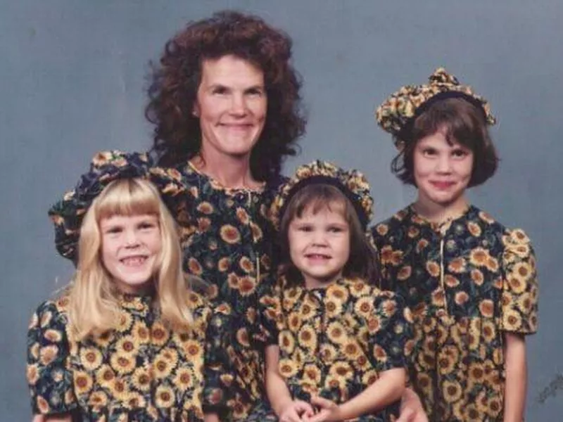 Family in matching sunflower outfits