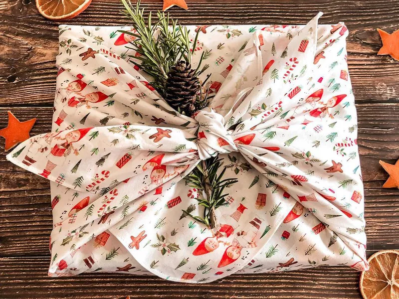 Christmas fabric used as gift wrap