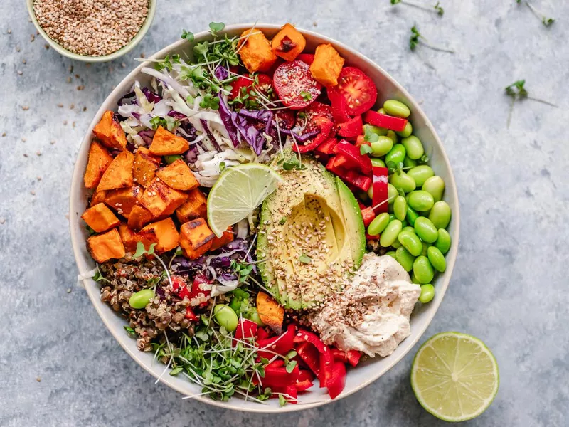 Colourful vegan bowl with quinoa and sweet potato