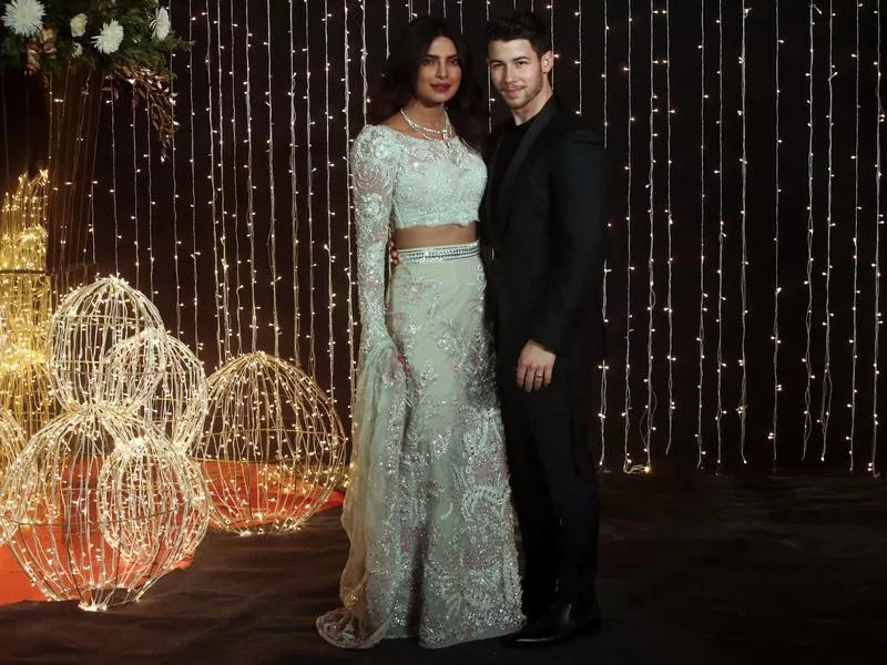 Priyanka Chopra and Nick Jonas pose for photographs