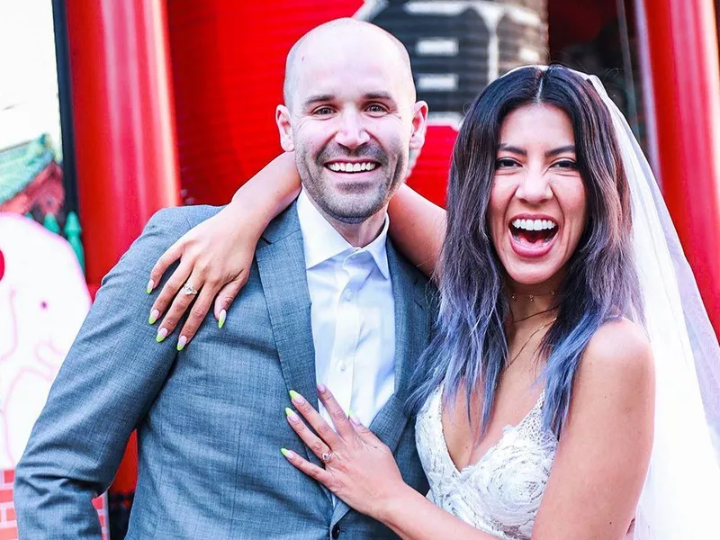 Beatriz and her husband on wedding day