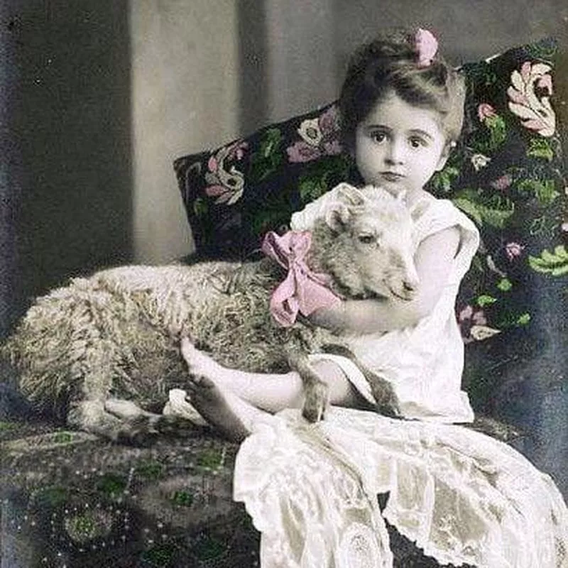 Little girl and Easter lamb