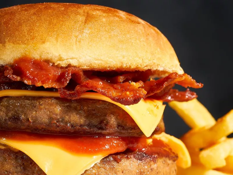 Hamburger with bacon cheddar and french fries