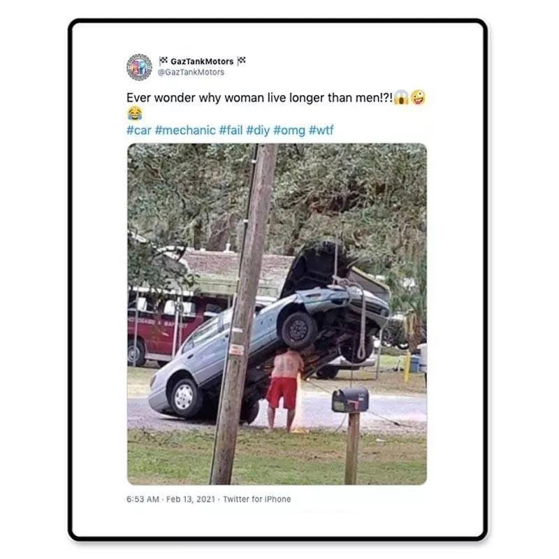 Man fixing car from underneath