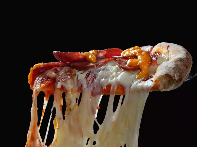 Pizza slice melted cheese