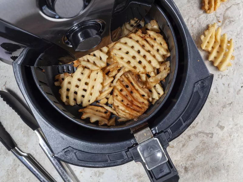 Air frying waffle potato fries at home