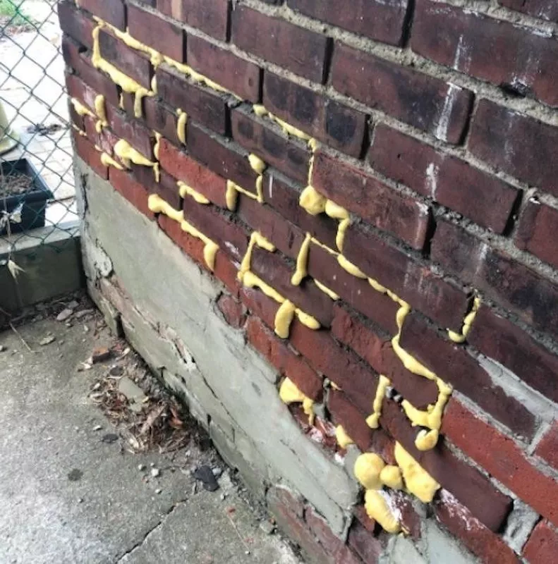 Spray foam used to fill bricks