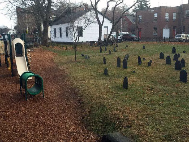 playground beside cemetery