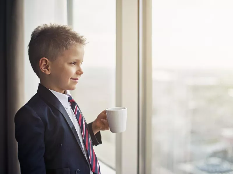 Portrait of a cute little business man