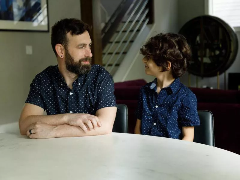 Father and Son Sitting