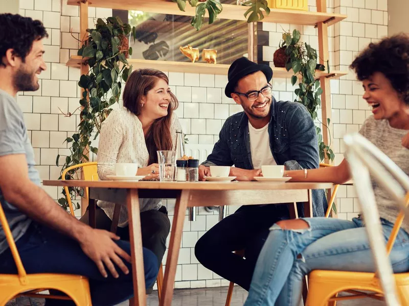 Friends having a great time in cafe