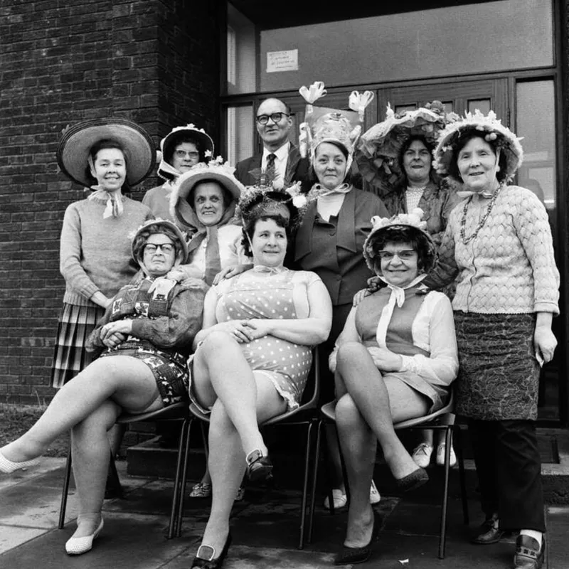 A group of ladies in bonnets