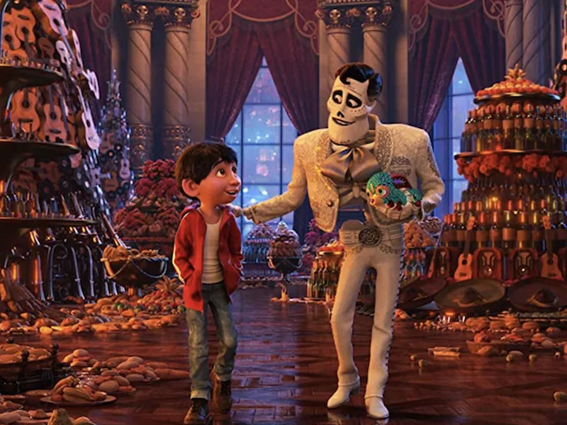 Ernesto de la Cruz and Miguel in Coco