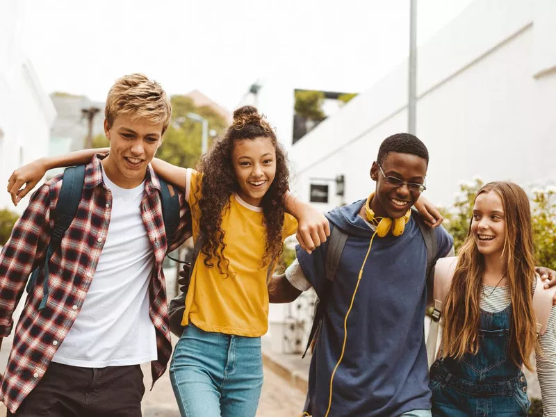 Friends walking in the street