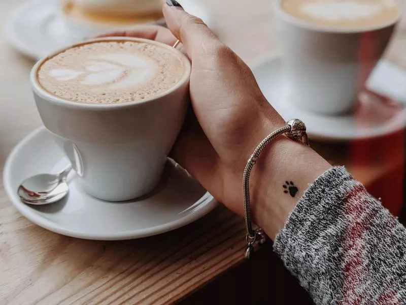 Tiny Paw Tattoo on Wrist