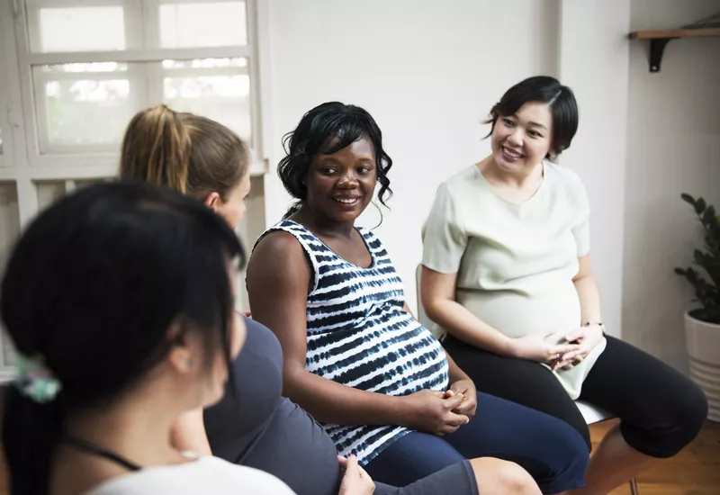 Pregnant women in a parenting class