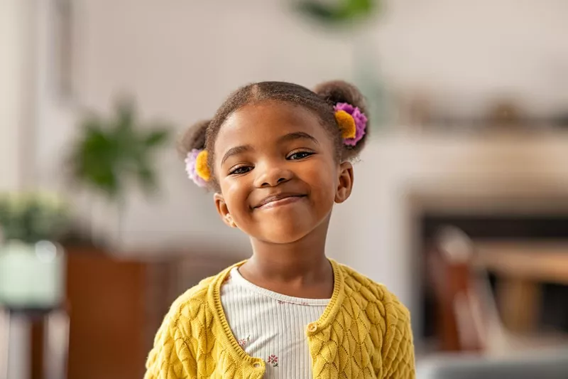 Cute little girl looking at camera