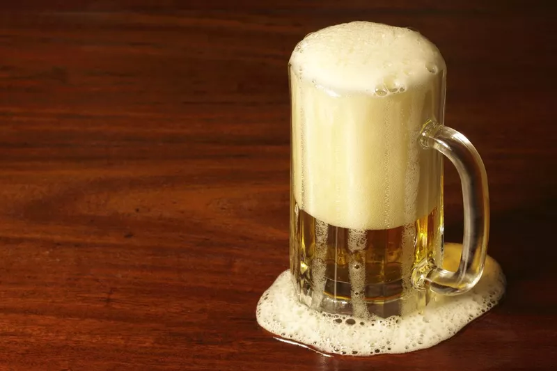 Frothy mug of beer