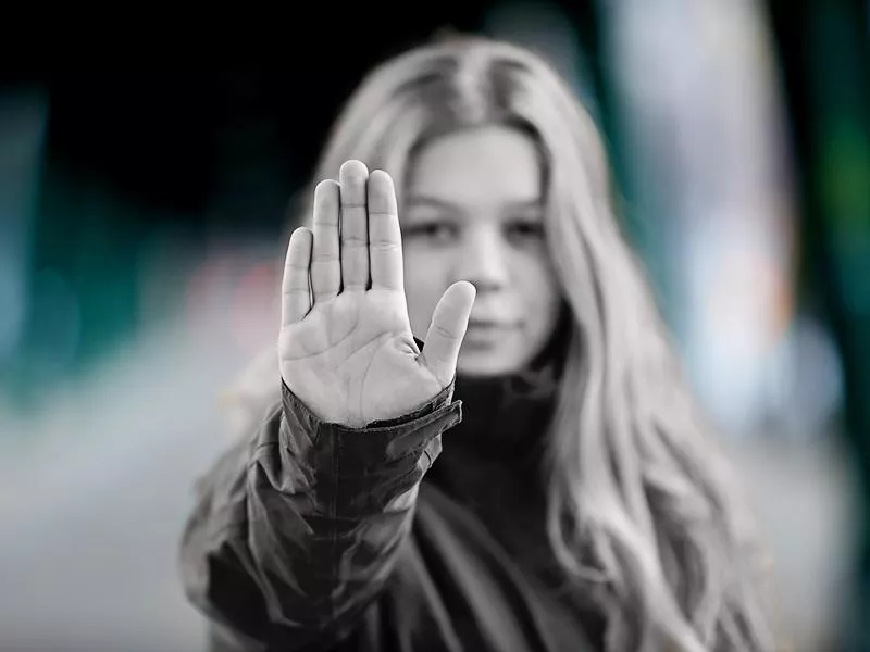 Woman making stop gesture