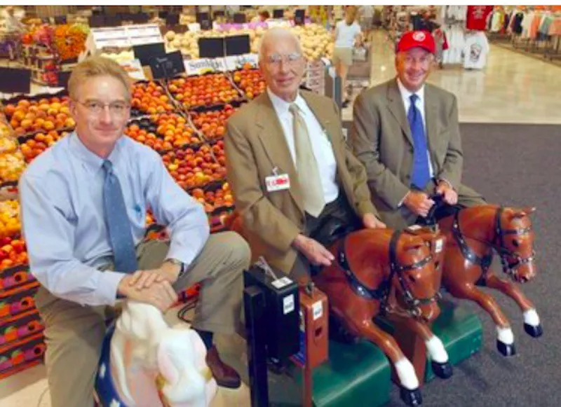 Meijer family pose in grocery store