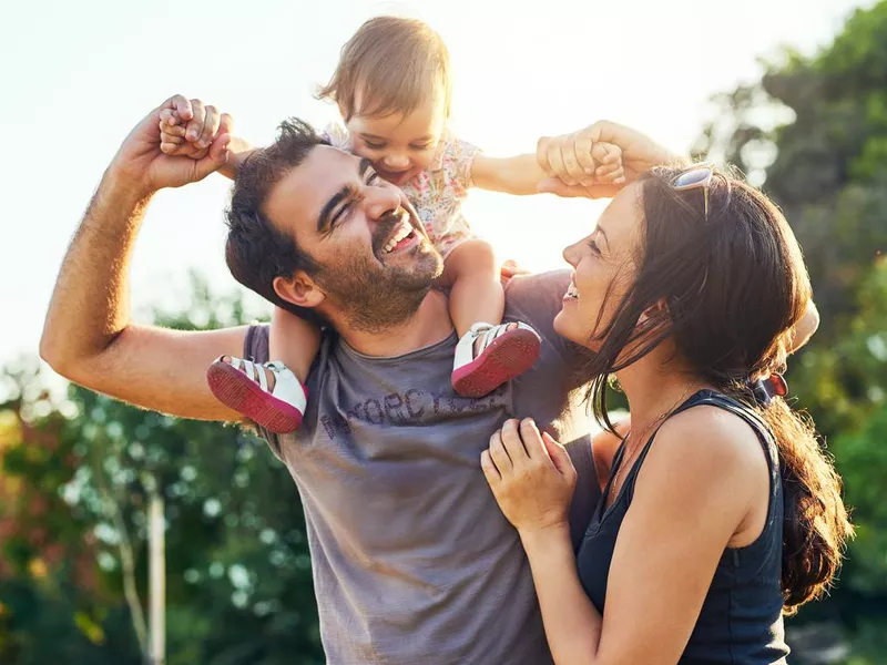 Mom and dad enjoy bonding time with baby