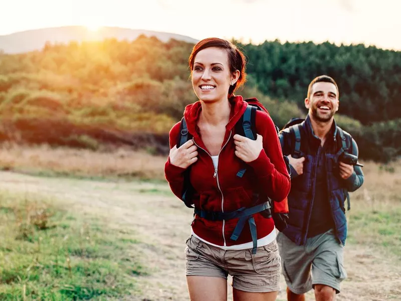 Man and woman hiking in the mountain