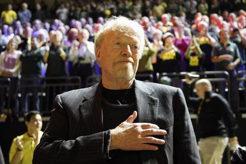 Phil Knight at basketball game