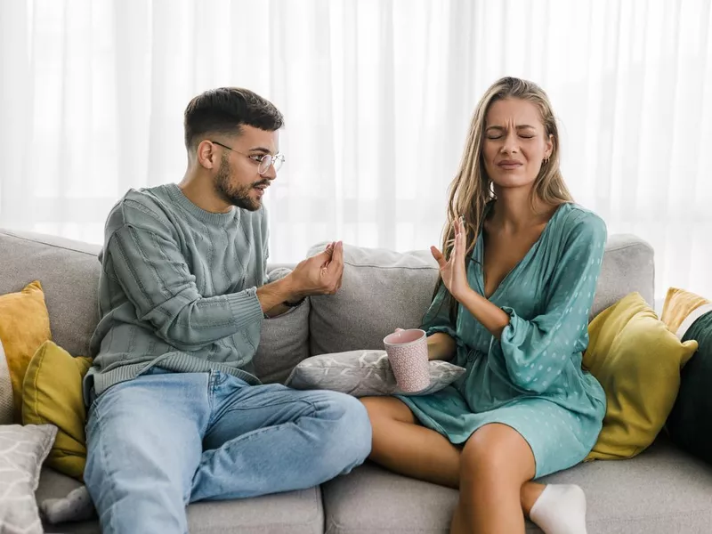 Shot of a young couple having an argument at home