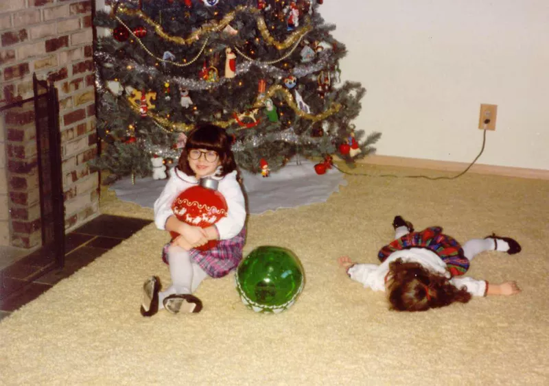 Sisters in front of the Christmas tree