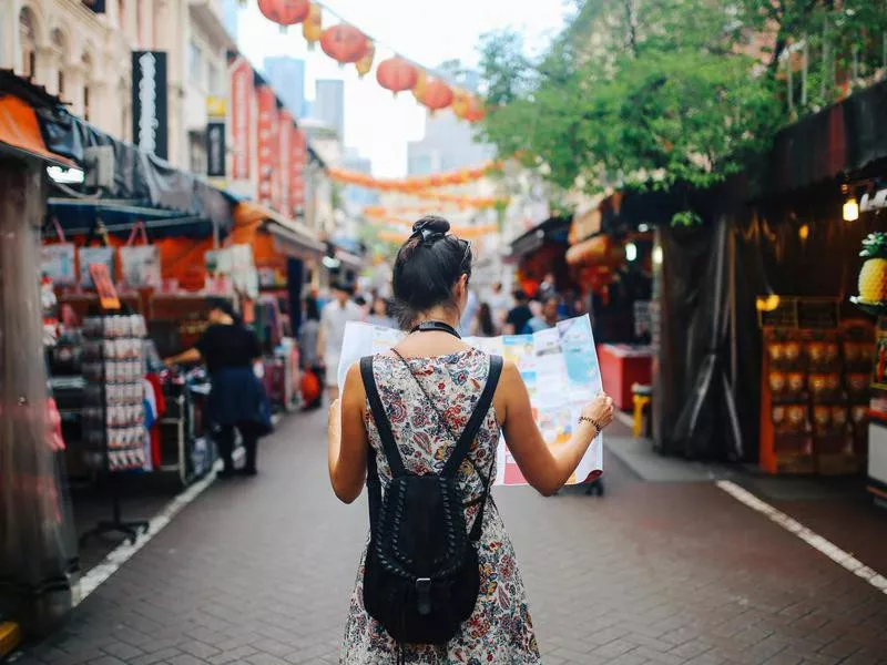 young solo traveler woman in Singapore