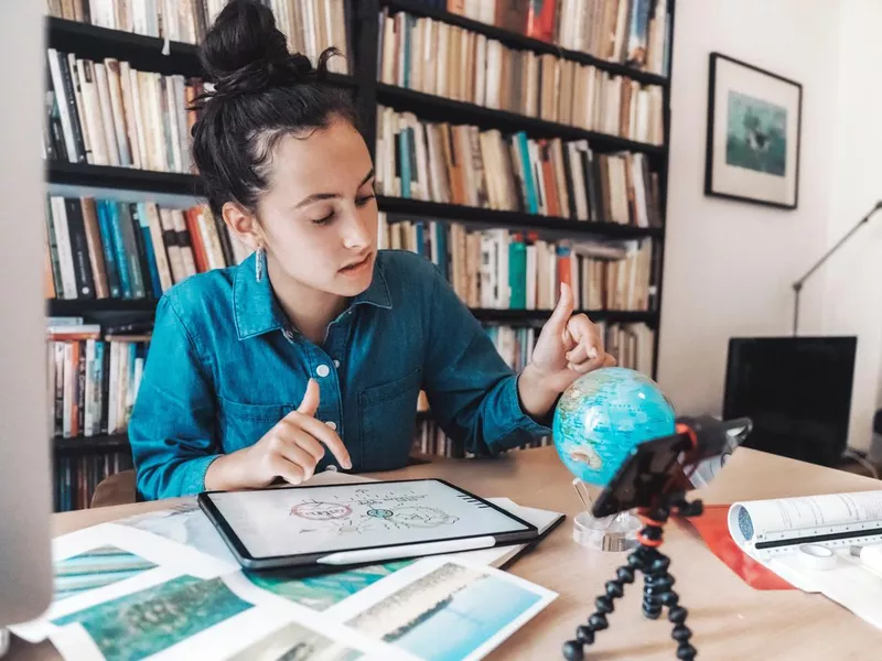 Girl preparing presentation for climate change issues