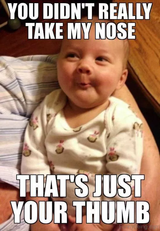 Photo of a baby making a funny face