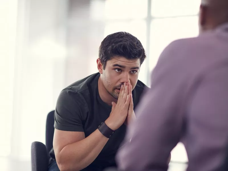 man talking with a colleague