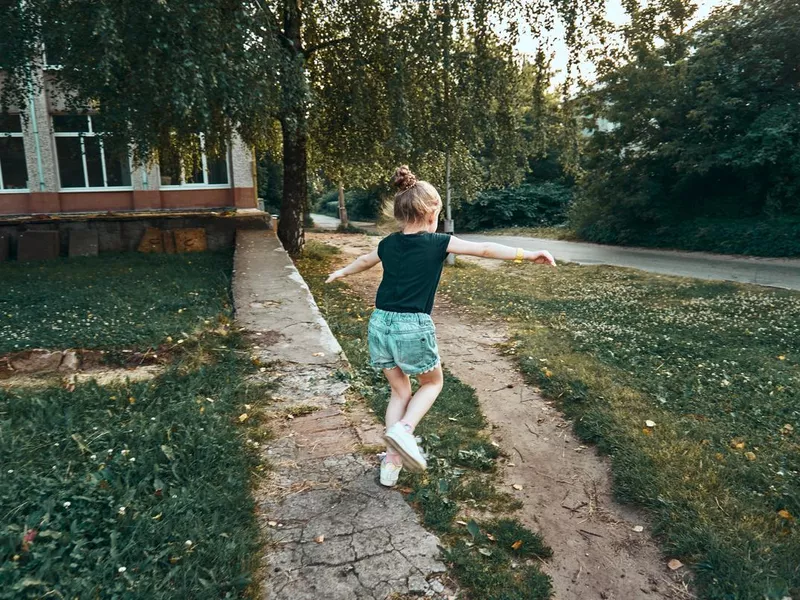 girl playing outside