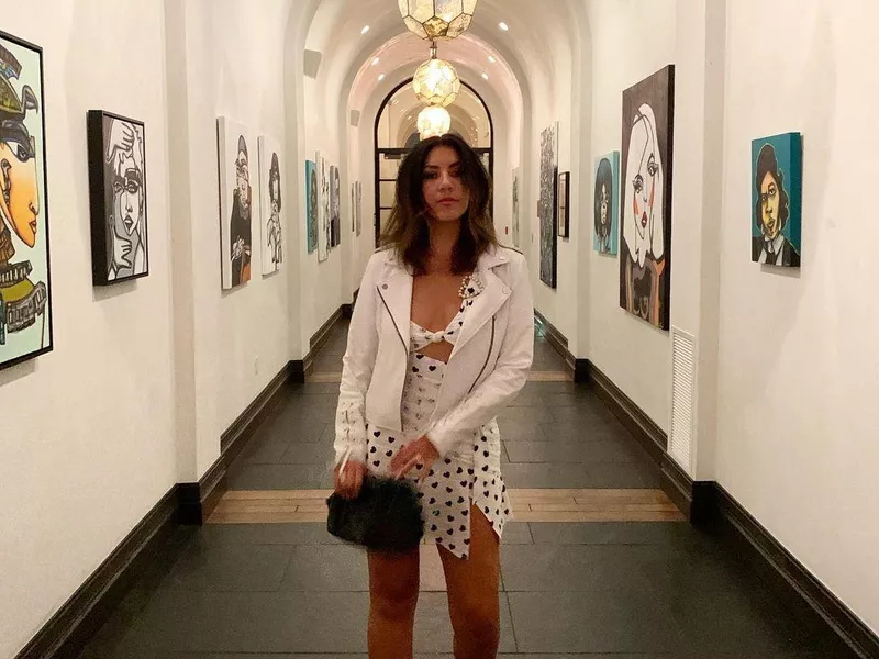 Stephanie Beatriz posing in art gallery