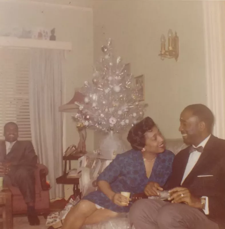 Couple in front of tree