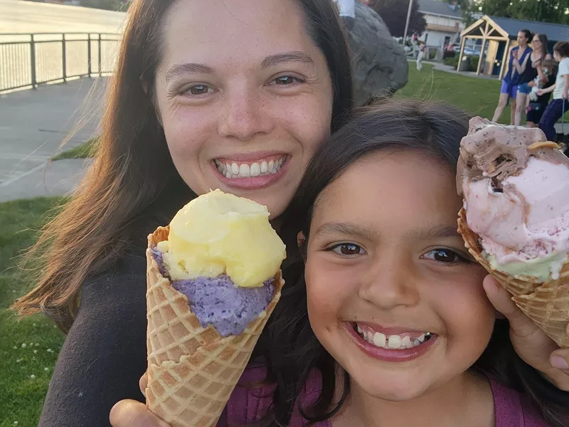 Mother and daughter eating ice cream